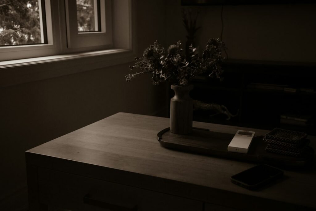 A quiet table by a window with a simple natural setting