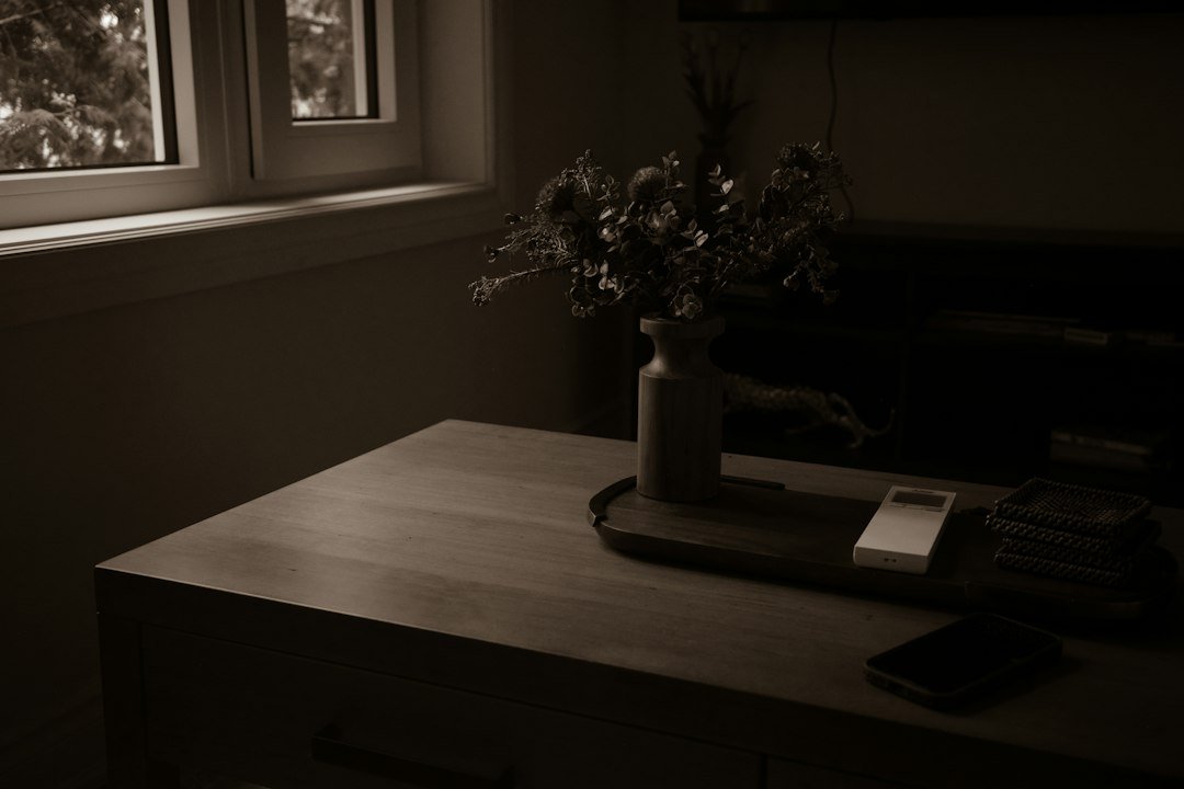 A quiet table by a window with a simple natural setting